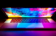 古尔曼：配备 OLED 触控屏的全新苹果 MacBook Pro 将大幅减重