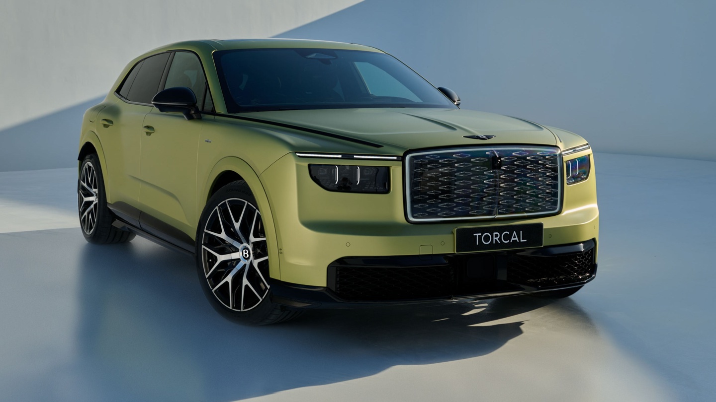 A luxury SUV with a unique green exterior and bold front grille, set against a minimalist backdrop.