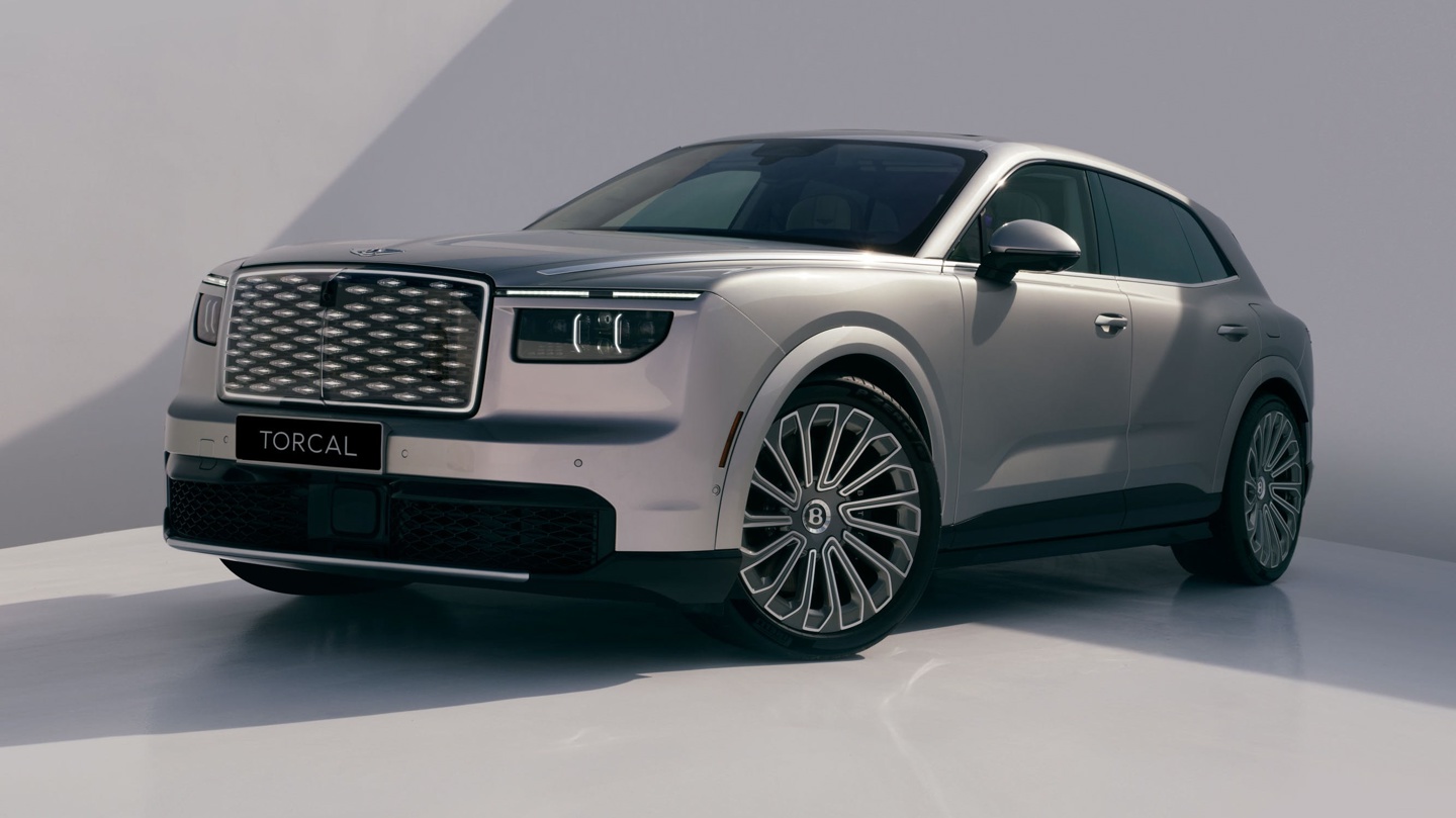 Modern SUV with a sleek design, prominent grille, and stylish alloy wheels displayed in a minimalist setting.